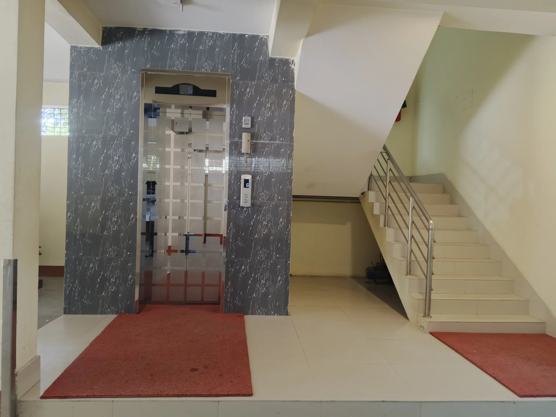 Staircase & Modern Elevator Area